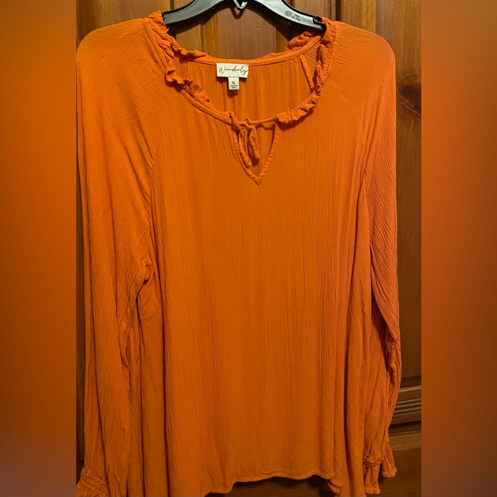 Ladies long sleeve orange blouse. Size XL. Preowned from Wonderly. .